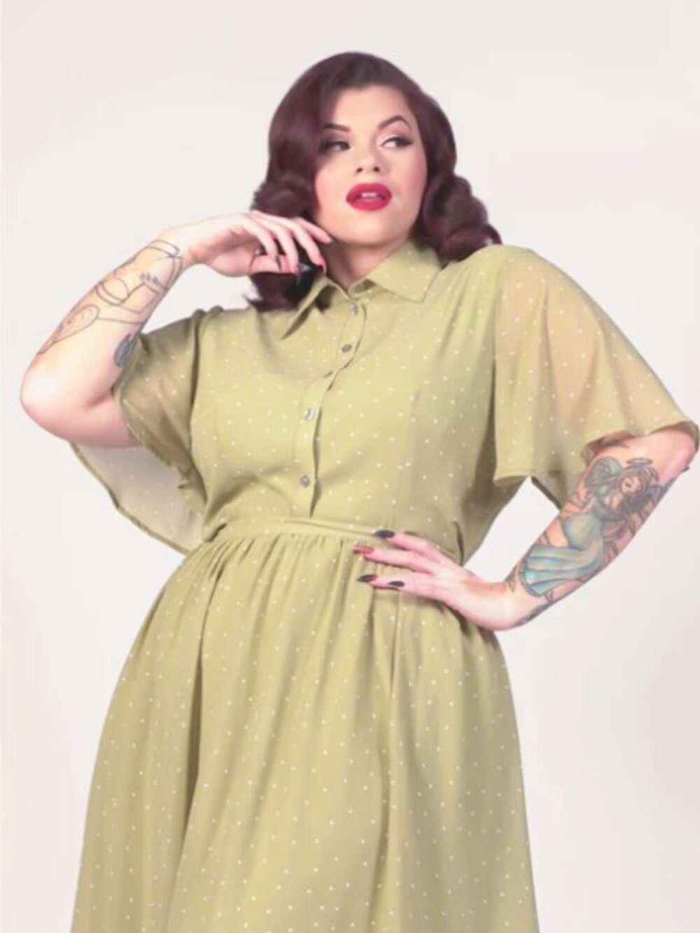 70's Women's Green And White Polka Dot Short Sleeve Buttoned Flutter Top